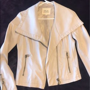 Cream jacket with zipper details